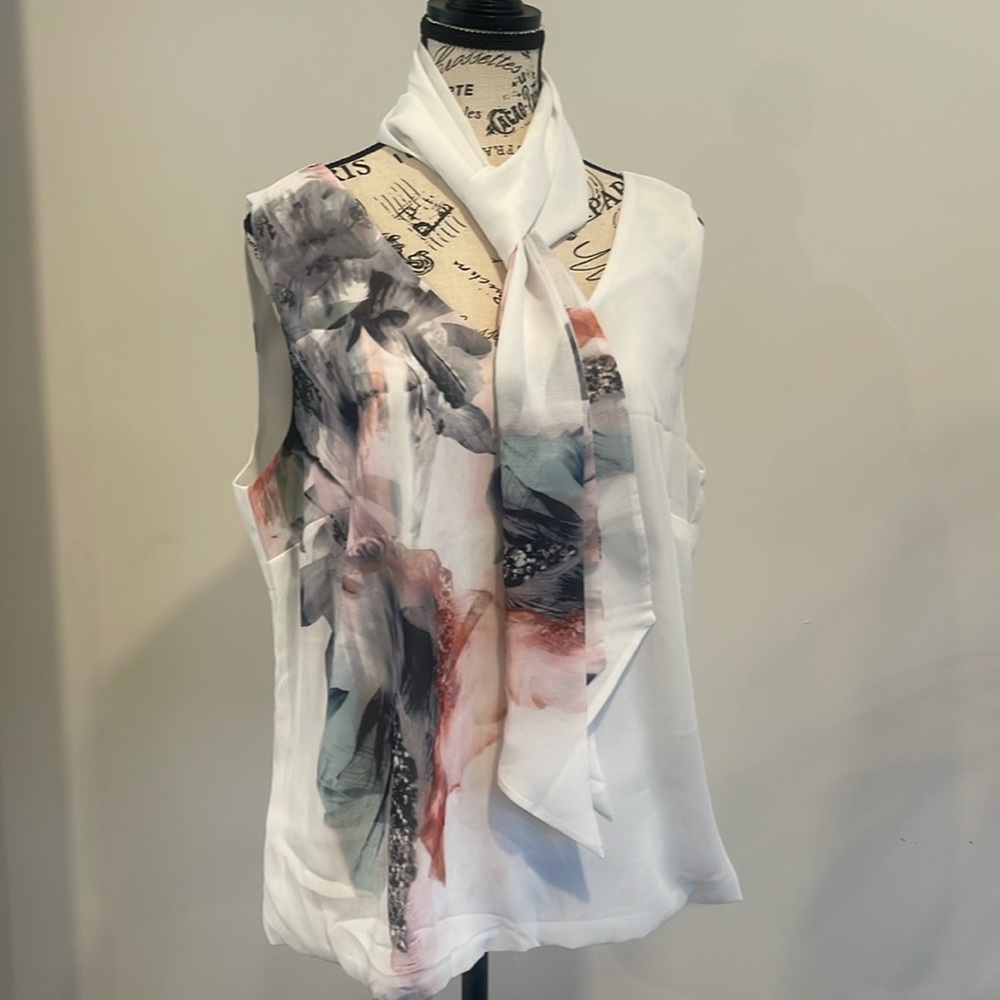 Elegant Sleeveless Blouse with Artistic Print & Tie Neck – Chic & Sophisticated